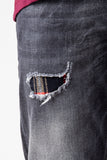 Schwarze Jeans mit karierten Taschen