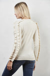 Sweater with ruffles