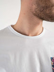 T-shirt con taschino floreale