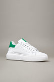 White sneaker with green retro high sole