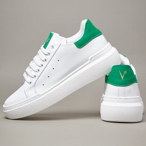 White sneaker with green retro high sole