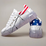 USA high-top sneakers with studs and paint splatters