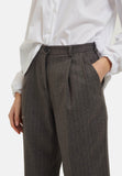 Pinstriped trousers with pleats